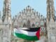 Nuovo blitz di Apuzzo srotola bandiera della Palestina sul Duomo di Milano